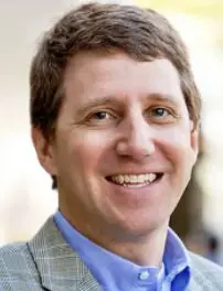 Smiling man in a suit jacket