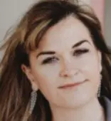Smiling woman with long earrings