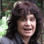 Happy individual in a garden setting