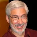 Abstract figure with graduation cap symbolizing education and achievement.