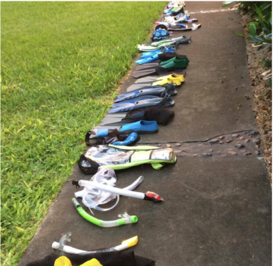 The walkway at my mom and dad’s house in Kona after a beach day with all their grandkids and their snorkels and fins.