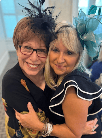 Jamie Saponaro and Barbara Bray hugging at the High Tea at ISTE 2025