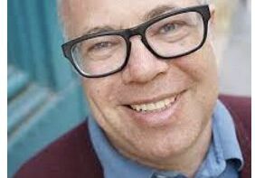 Smiling man with glasses