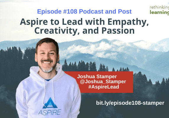 Smiling man in Aspire hoodie, mountain background