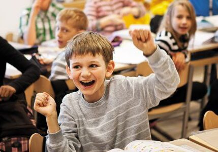 Excited students in a classroom