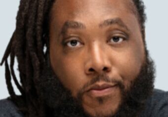 Man with long dreadlocks and beard