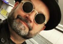 Man wearing sunglasses and hat