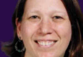 Woman wearing hoop earrings and necklace