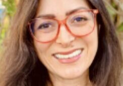 Smiling woman with long hair