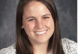 Smiling woman with brown hair