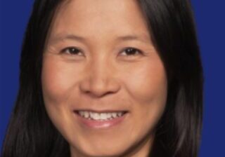 Smiling woman with dark hair