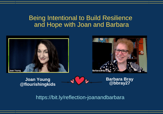 Two smiling women during online presentation