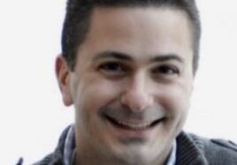 Happy individual with short hair