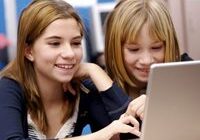 Friends studying on a computer