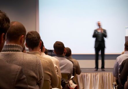 Conference with speaker and attendees
