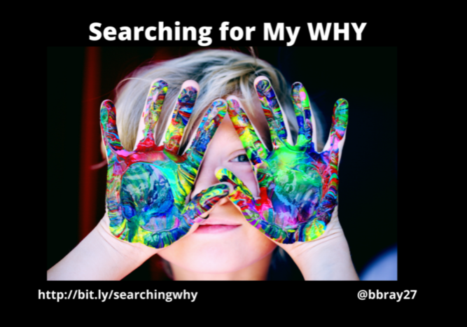 Child with colorful painted hands covering face