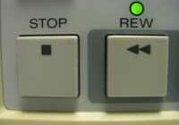 Stop and rewind buttons on a device